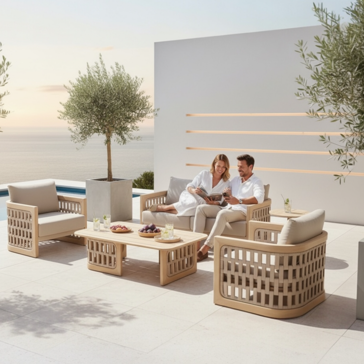 Palma Mini teak and rope loveseat set with two armchairs – shown outdoors