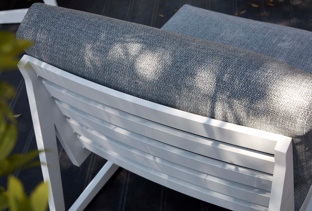 Leo 7-seat white aluminum L-shaped outdoor sectional with gray cushions – close-up detail