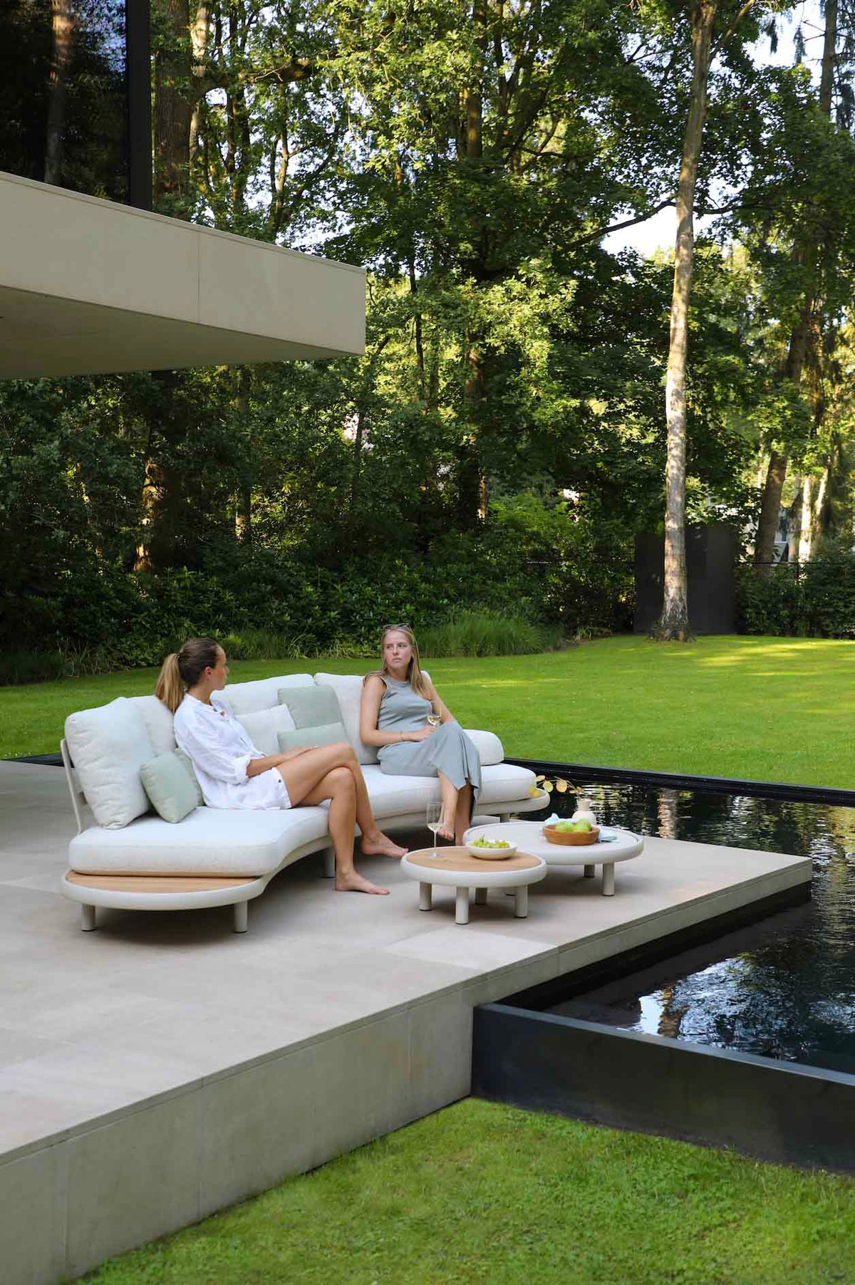 Rosa Mini compact aluminum and teak modular outdoor sofa set – shown outdoors (2)