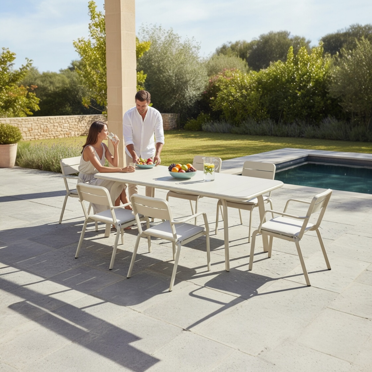 Joy 6-person aluminum outdoor dining set in beige – shown outdoors