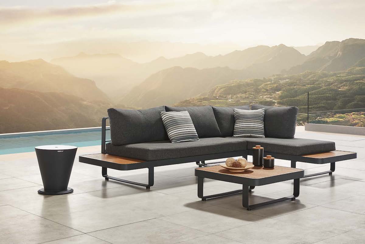 Caribbean anthracite aluminum outdoor sectional with teak side tablets – shown outdoors (3)