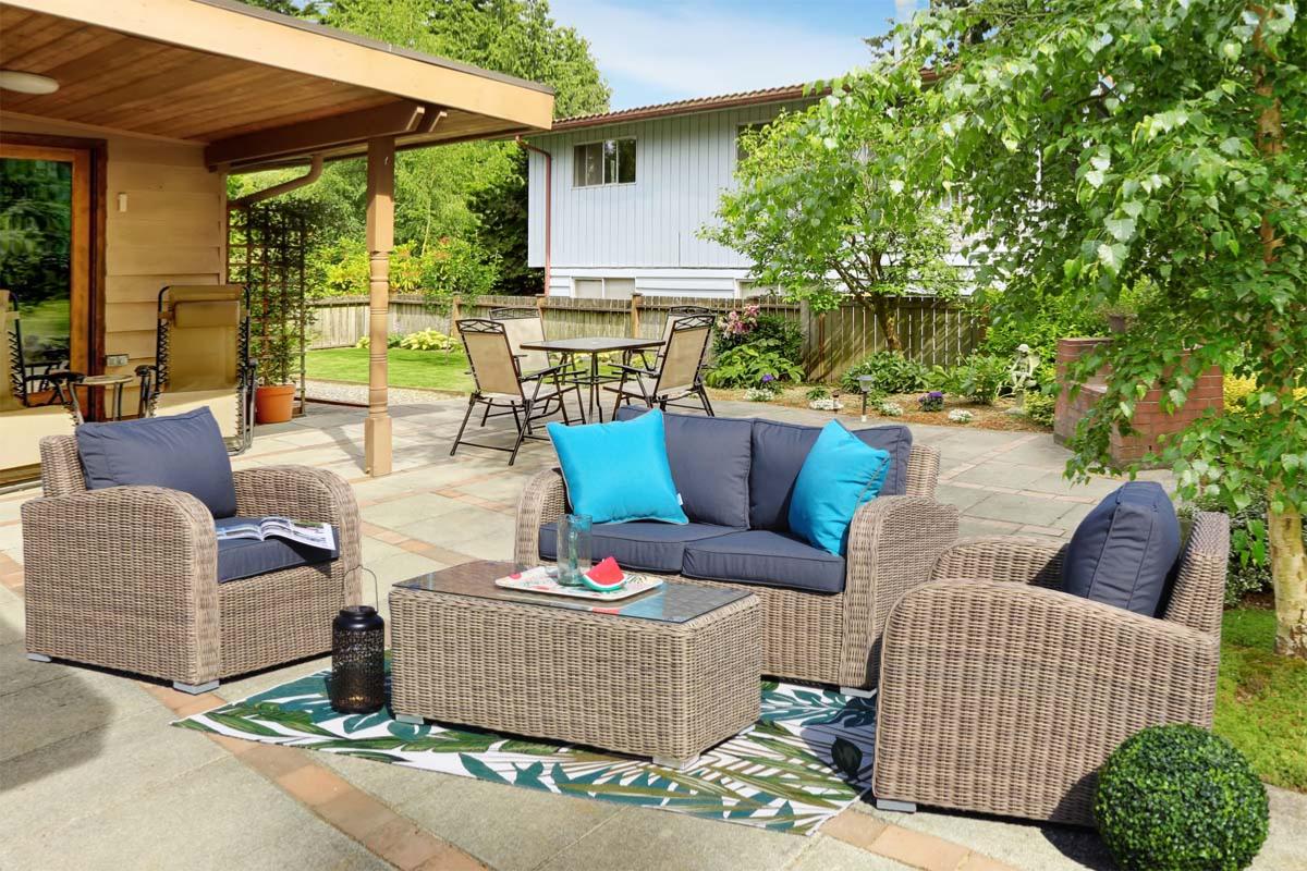 Tara resin wicker patio coffee table – shown outdoors