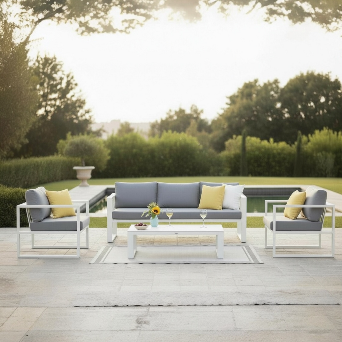 Jelly Bis aluminum patio set with white ceramic coffee table – shown outdoors