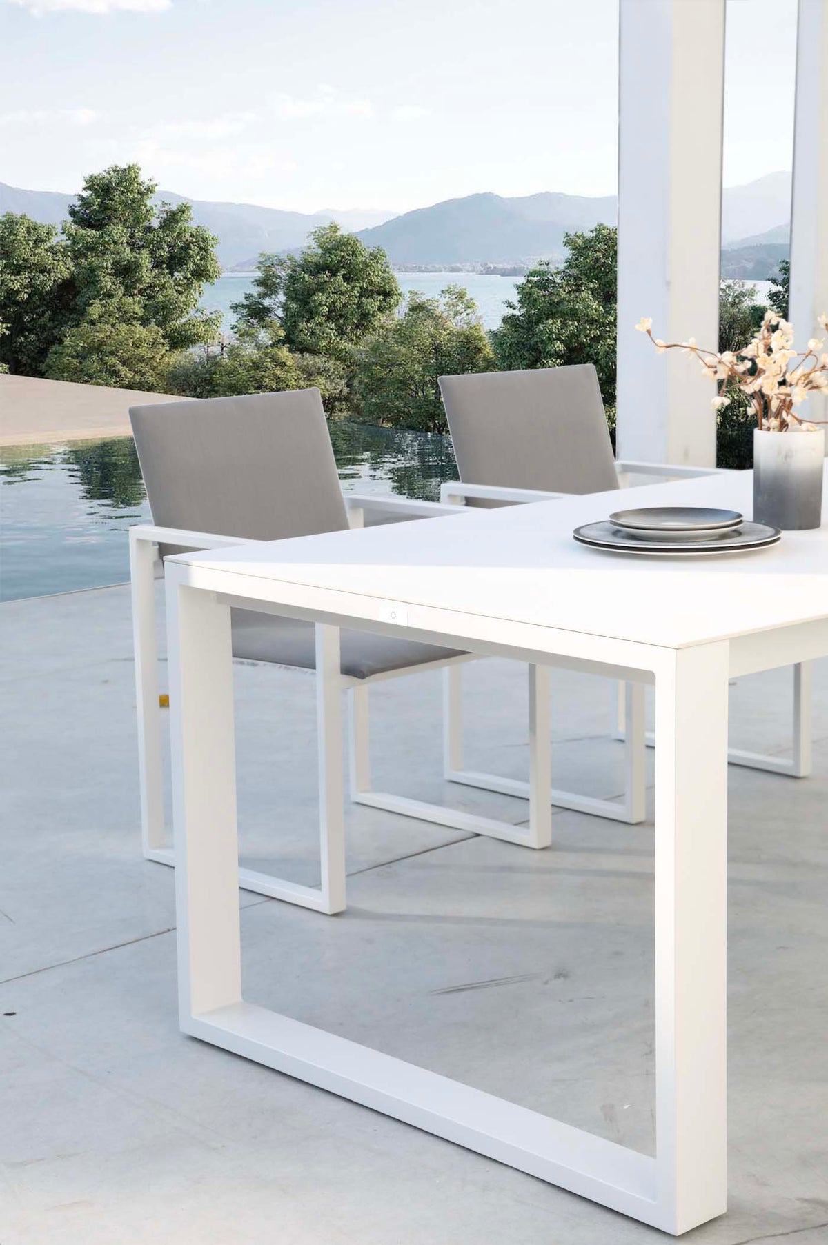 Como white aluminum ceramic-top outdoor dining table – shown outdoors (6)