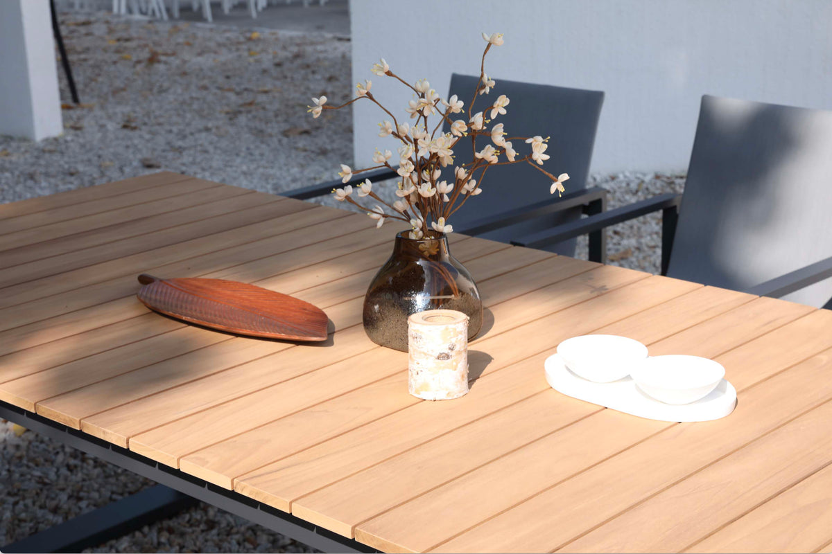 Como black aluminum and teak outdoor dining table, 240 cm – shown outdoors (5)