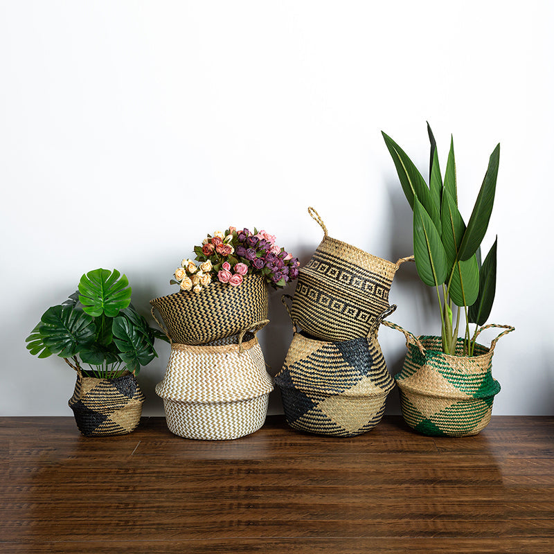 Foldable wicker and rattan planter basket with a rectangular motif – shown in a room setting
