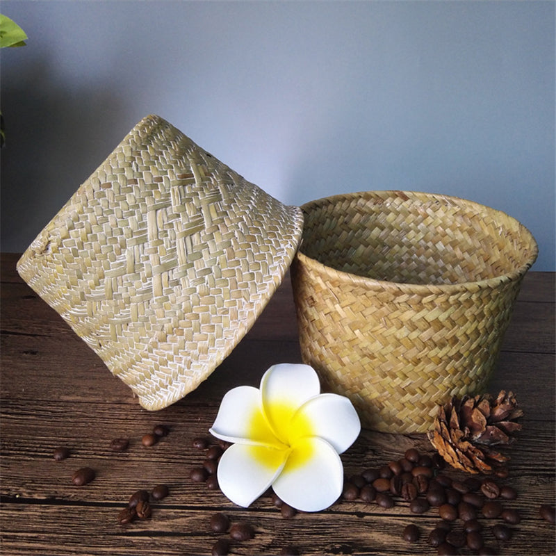 Handmade round rattan planter in white – shown in a room setting