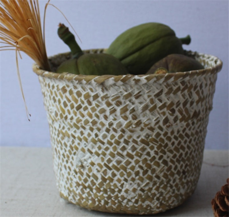 Handmade round rattan planter in white – shown in a room setting (2)