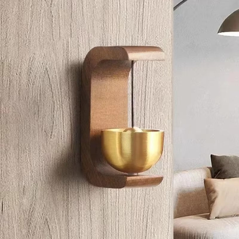 Bamboo wall chime on a hand-braided hanger – shown in a room setting