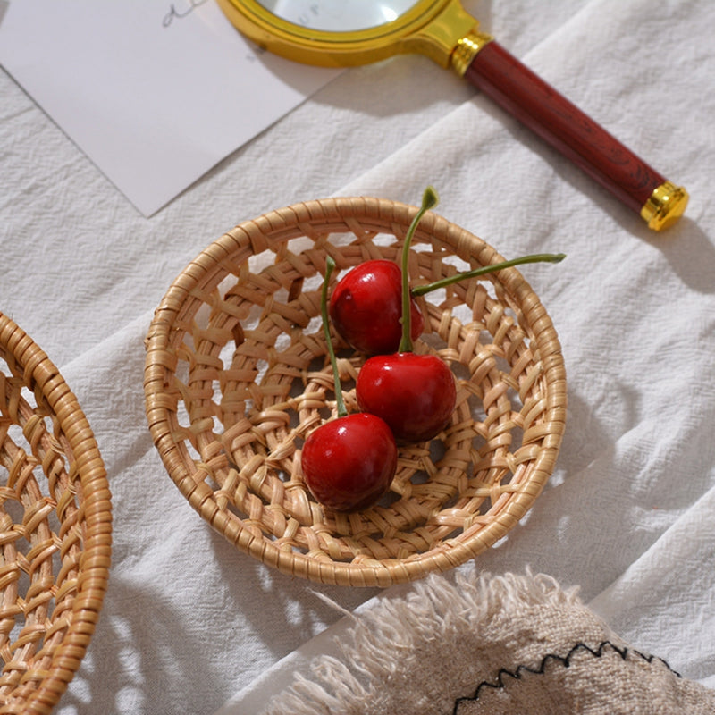 Round handwoven rattan bread and serving basket – shown in a room setting (2)