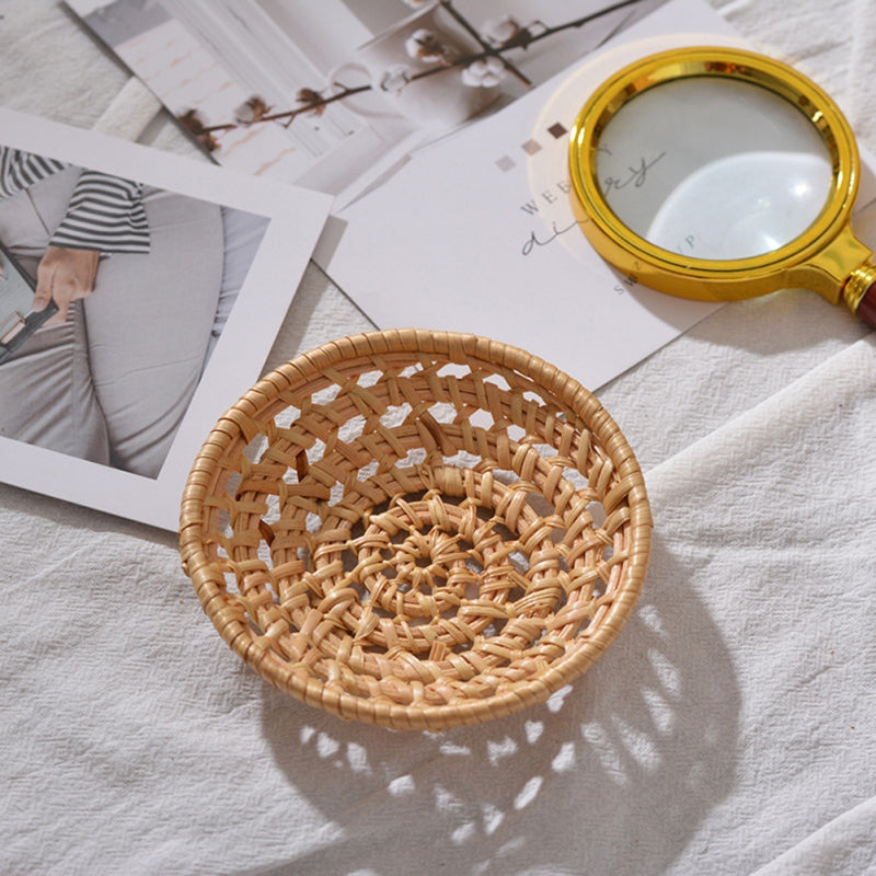 Round handwoven rattan bread and serving basket – shown in a room setting (5)