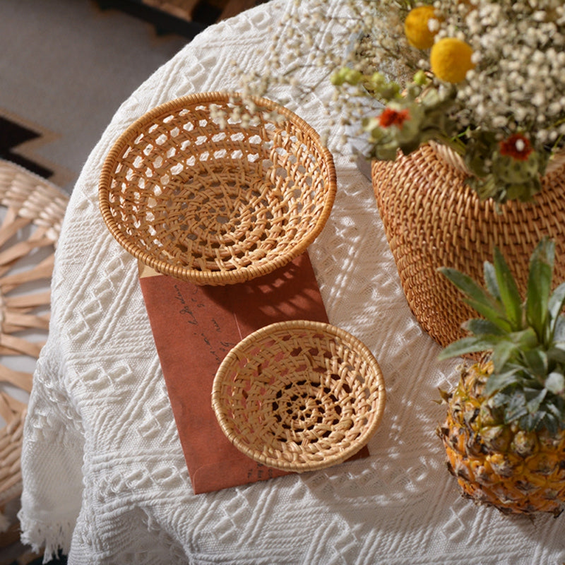 Round handwoven rattan bread and serving basket – shown in a room setting