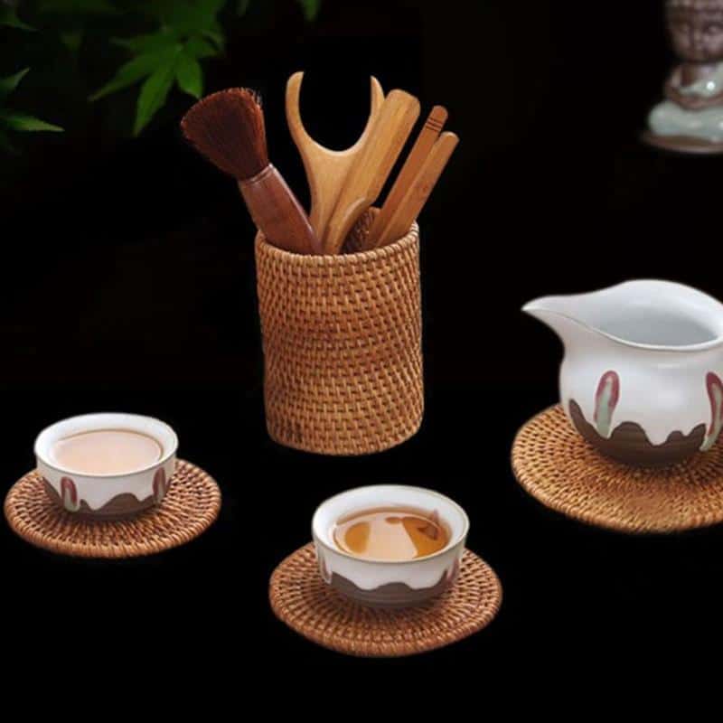 Round tightly woven rattan storage basket – shown in a room setting (2)