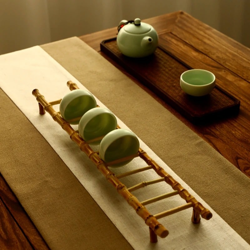 Bamboo ladder mug rack displaying cups – shown in a room setting