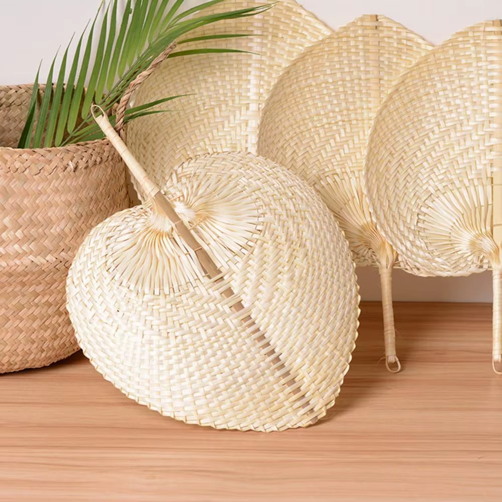 Handcrafted natural rattan fan wall decor – shown in a room setting (2)