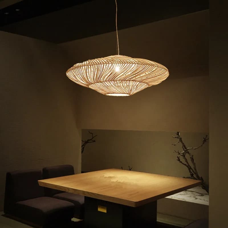 Chinese-style handwoven rattan lantern pendant light – shown lit in a room setting (2)