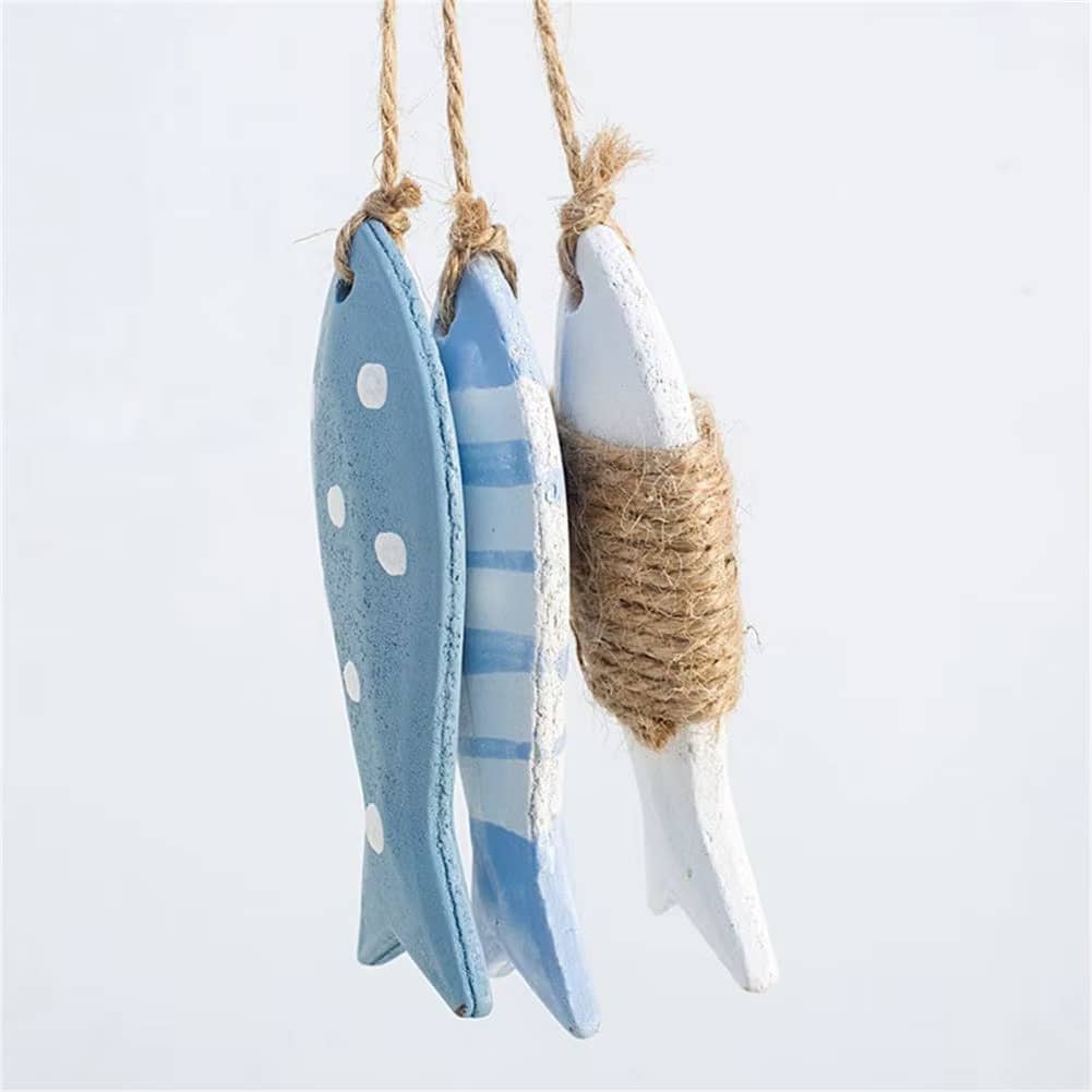 Set of three wooden fish in graduated sizes – another view