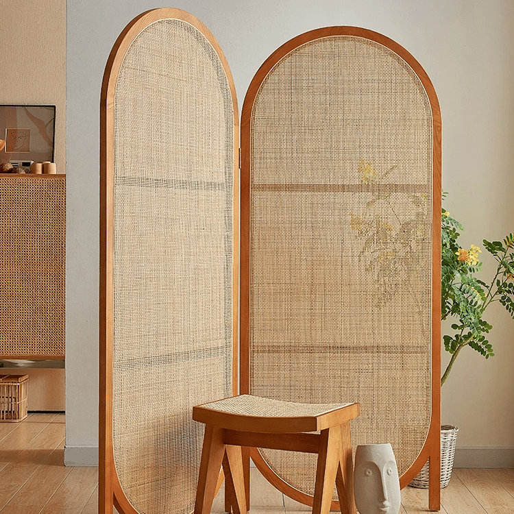 Double oval hand-braided rattan room divider – shown in a room setting