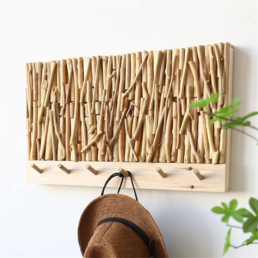 Decorative wooden wall organizer with integrated hooks – shown in a room setting