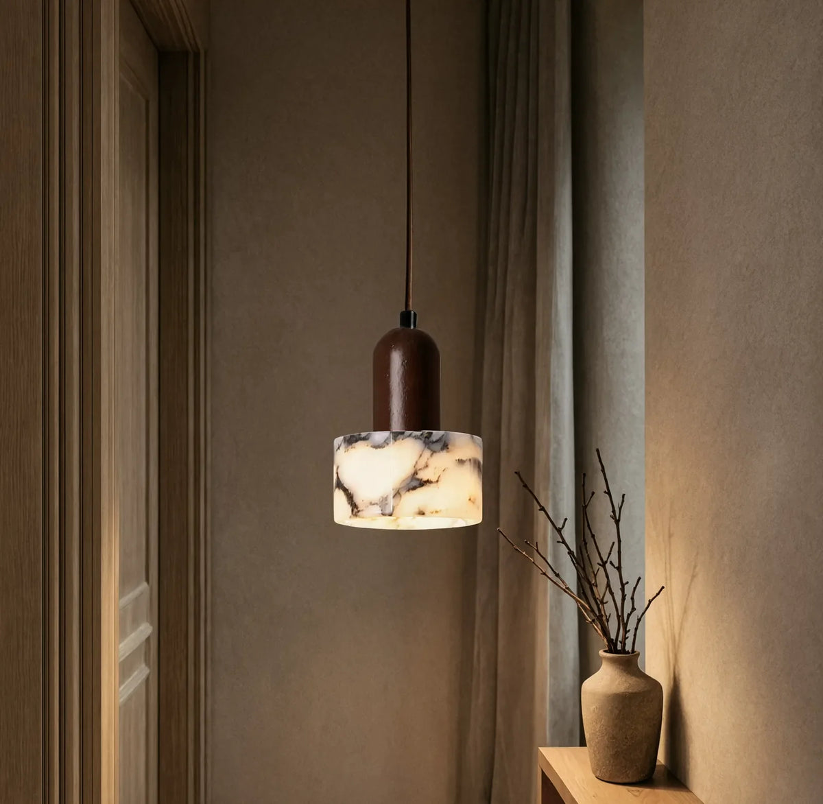 Himère marble and dark wood pendant light – shown in an entryway
