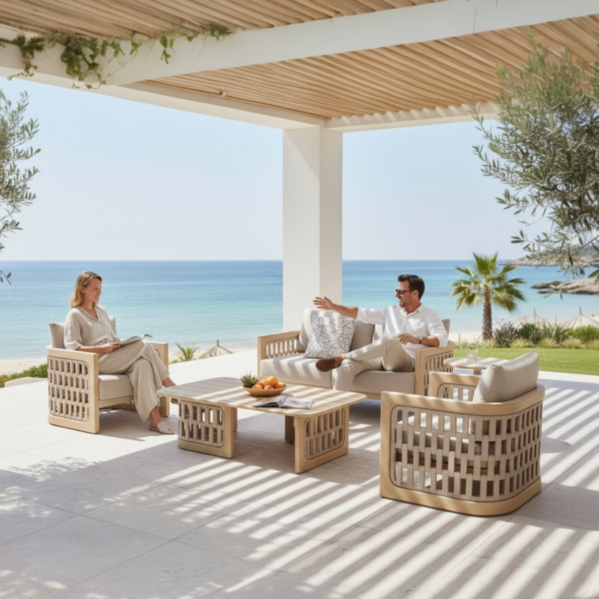 Palma Mini teak and rope loveseat set with two armchairs – shown outdoors (2)
