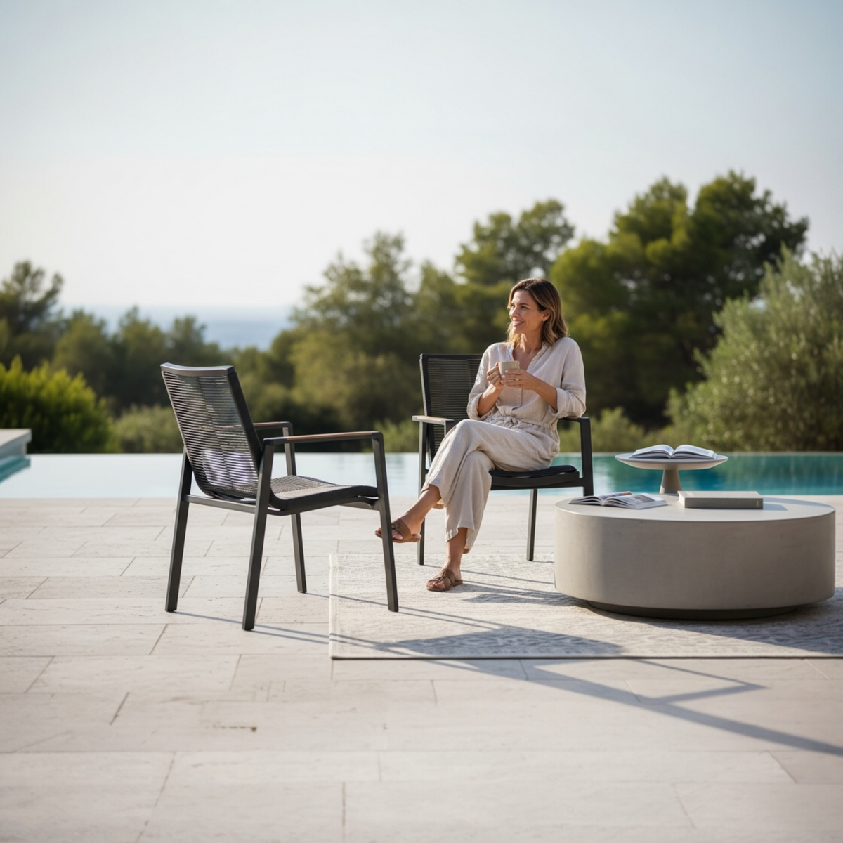 Noffy stackable aluminum restaurant patio chair with teak armrests – shown outdoors