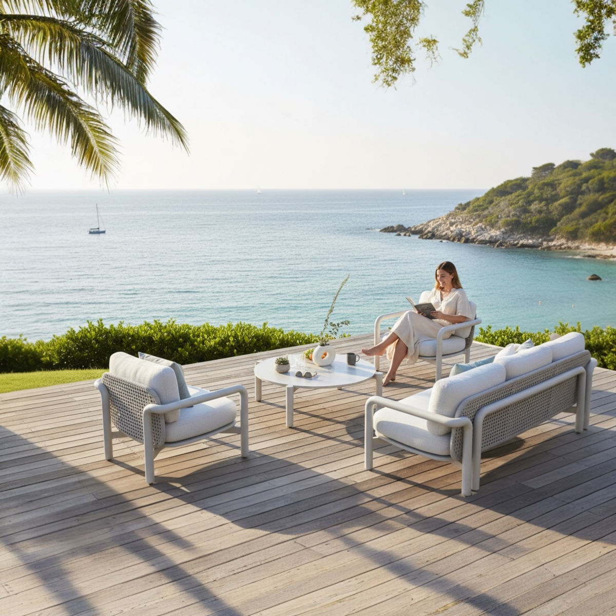 Amaia aluminum and rope patio set with cylindrical sofa and ceramic table – shown outdoors