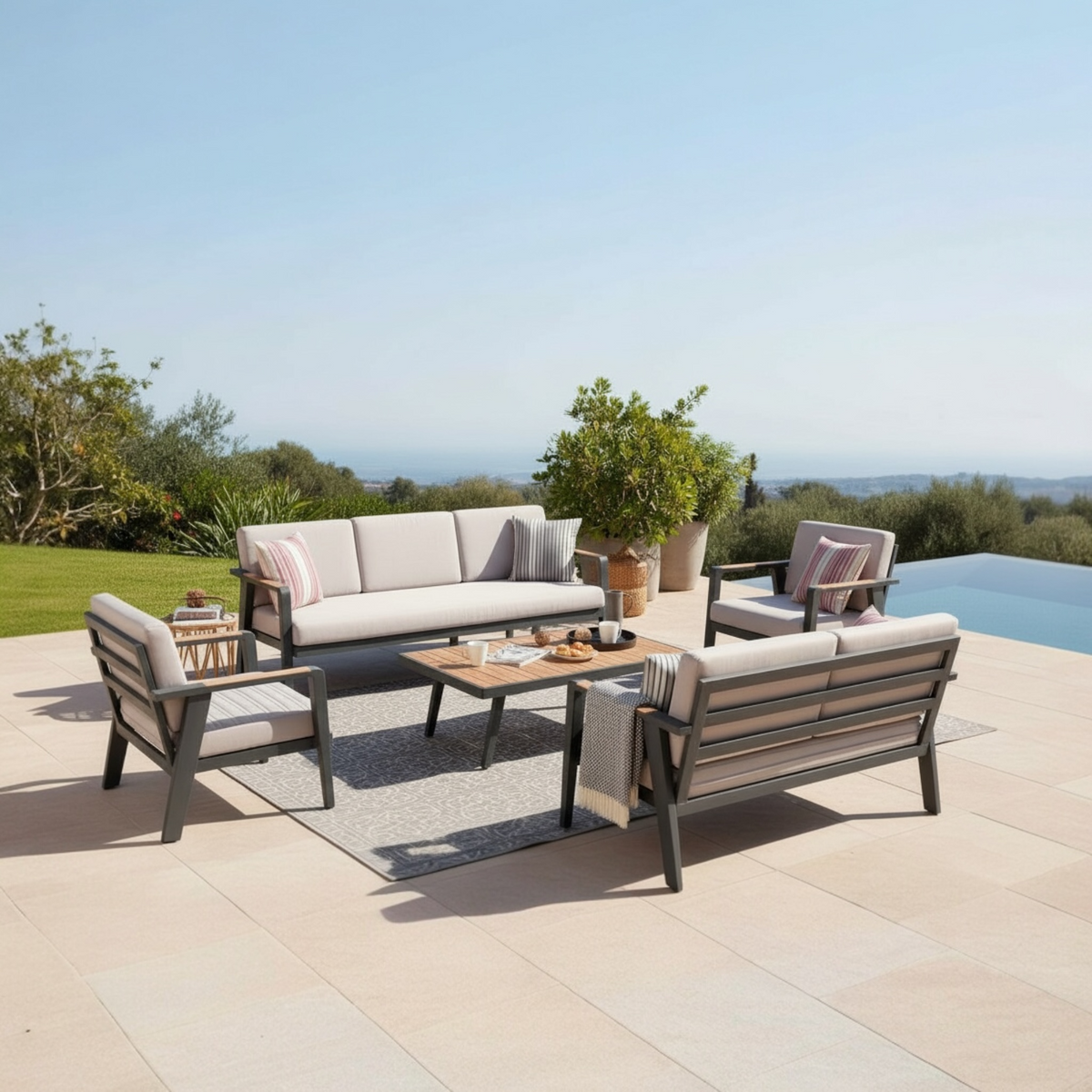 Lovy XL 7-seat aluminum and teak patio set with taupe cushions – shown outdoors