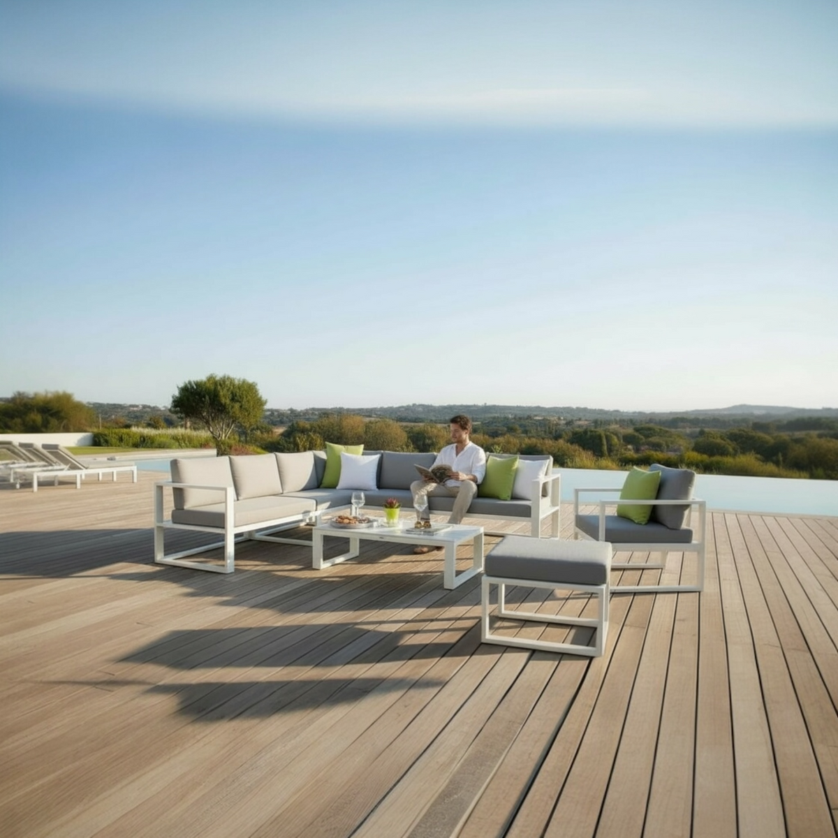 Belly Cool 8-seat aluminum outdoor sectional with pouf and coffee table – shown outdoors