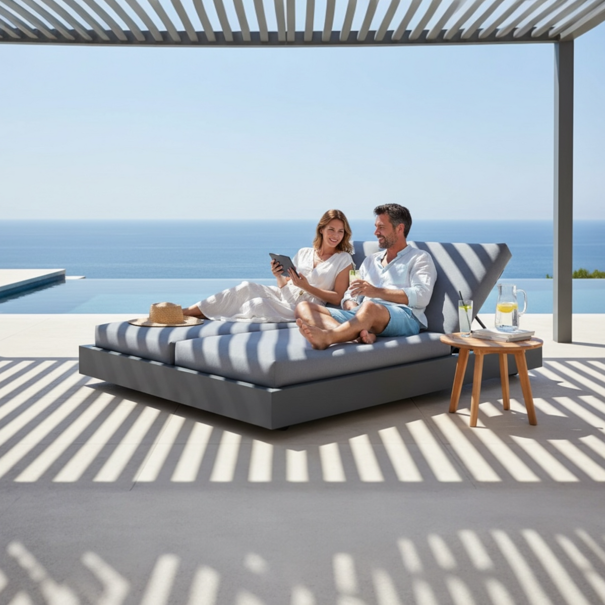Como Bed black aluminum double chaise lounge – shown outdoors