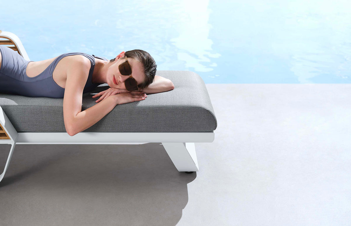 Aily aluminum and teak chaise lounge – shown outdoors (5)