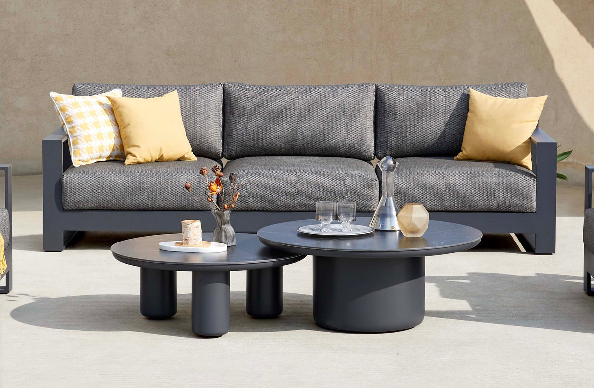 Iris extra-long black aluminum 3-seat outdoor sofa – shown outdoors (3)