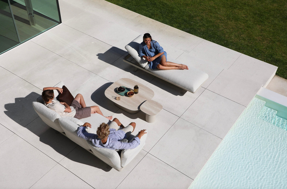 Camille 3-seat aluminum outdoor sofa that converts to a lounger – shown outdoors (4)