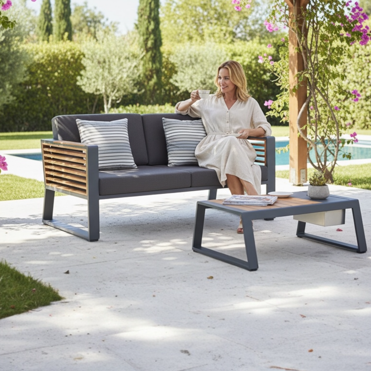 Cofy 2-seat aluminum and teak outdoor loveseat – shown outdoors