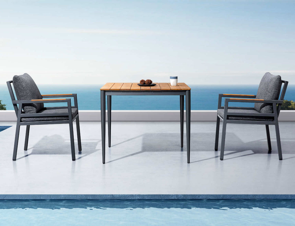 Gloria square aluminum and teak patio dining set for four – shown outdoors (4)