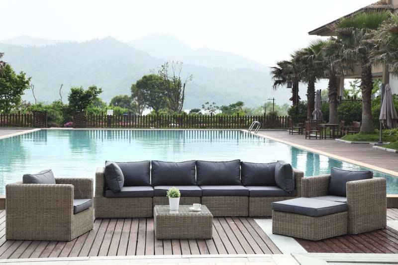 Liberty round resin wicker corner chair – shown outdoors (2)