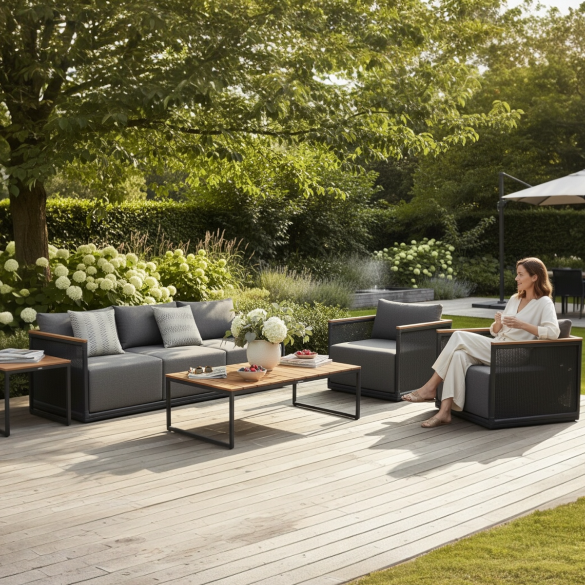 Rio 5-seat aluminum and teak lounge set with large teak coffee table – shown outdoors (2)