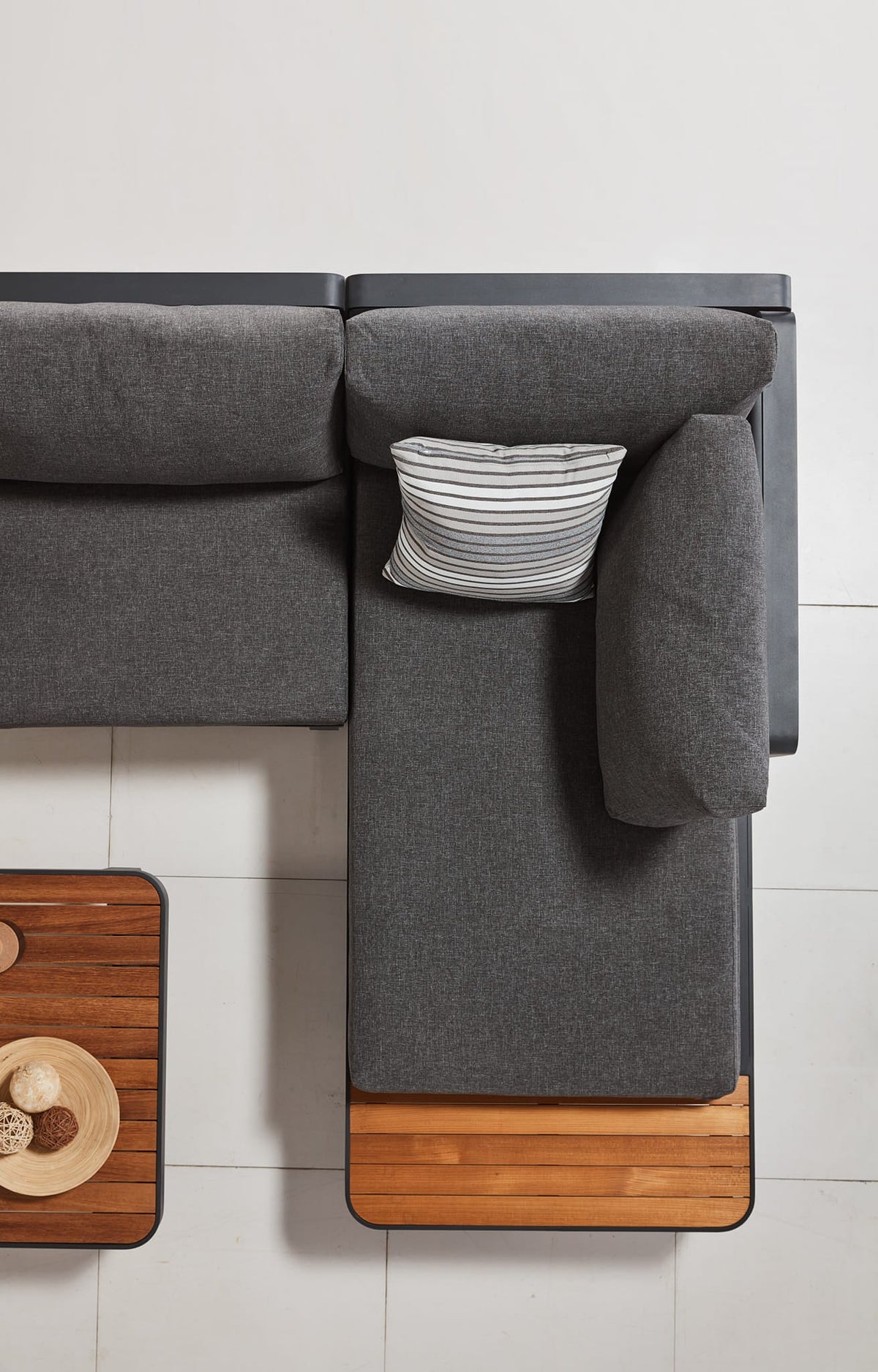 Chaise from the Caribbean anthracite aluminum outdoor sectional with teak side tablets – close-up detail