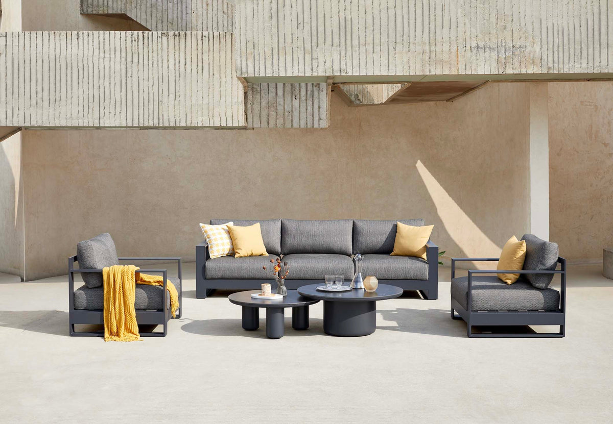 Iris extra-long black aluminum 3-seat outdoor sofa – shown outdoors (4)