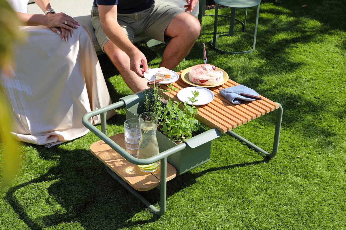 Sunny green convertible aluminum outdoor sofa lounger – shown in use