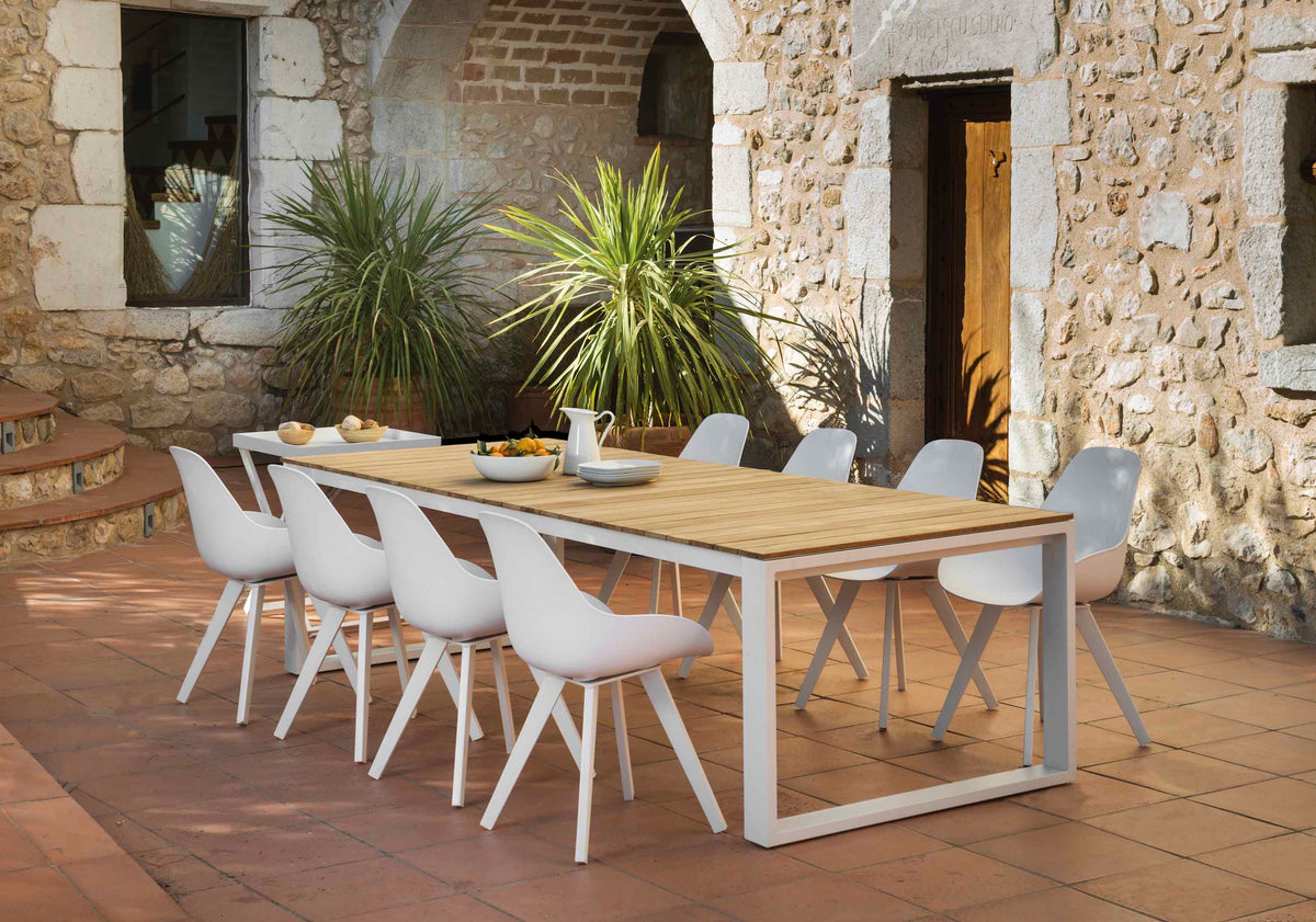 Como white aluminum and teak outdoor dining table, 240 cm – shown outdoors (3)