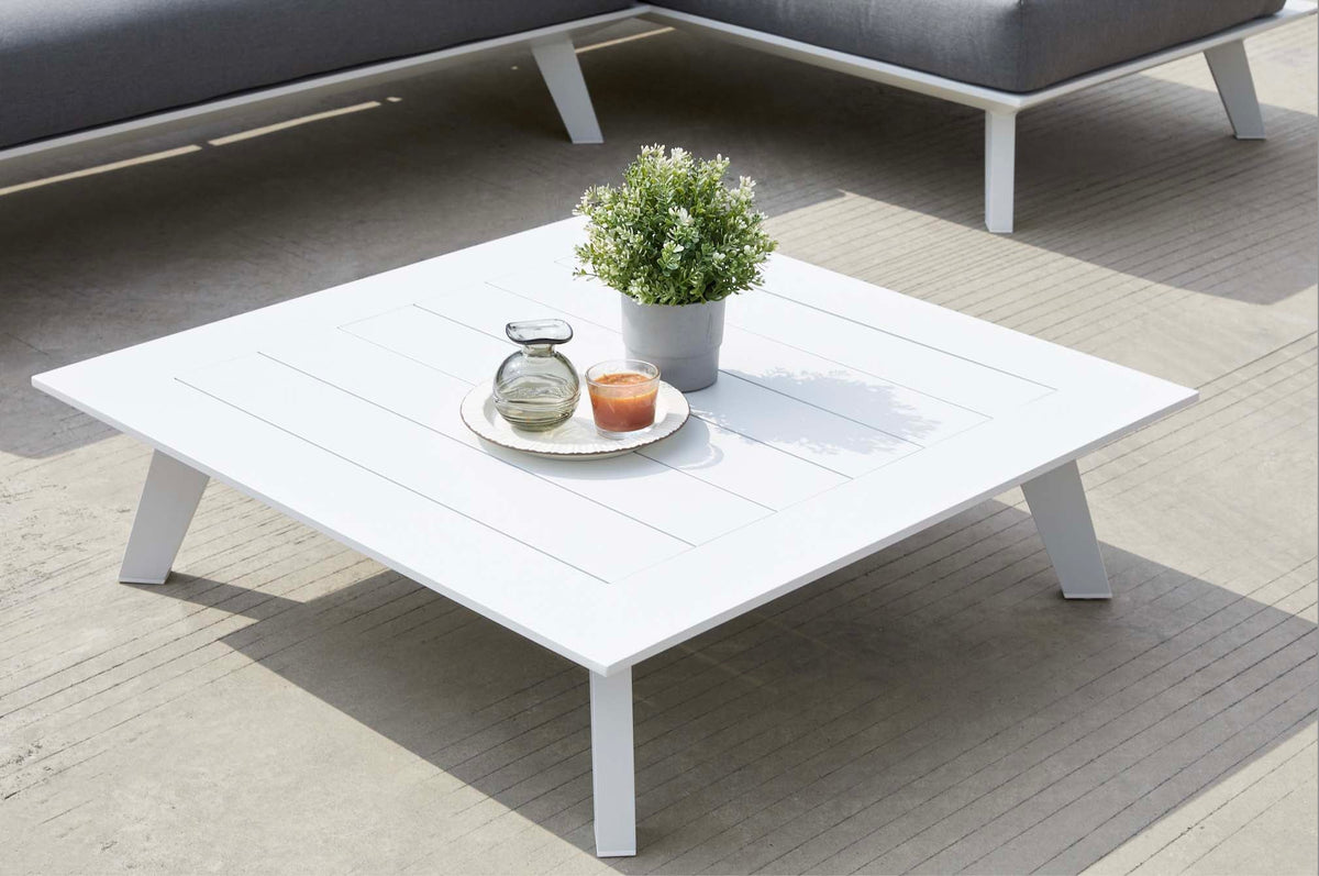 Coffee table from the Tiny Mini white modular corner sofa – shown outdoors