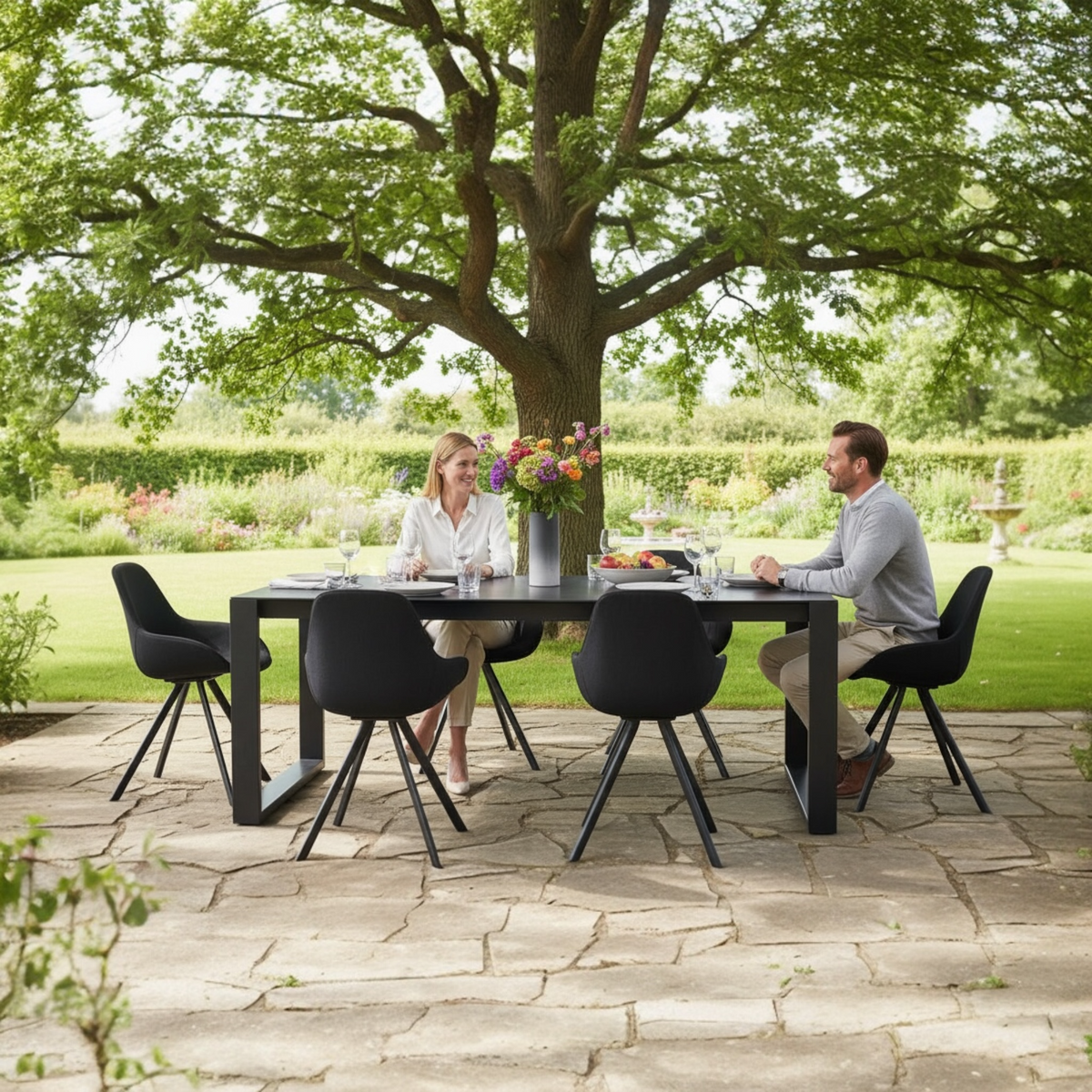 Como black aluminum ceramic-top outdoor dining table – shown outdoors (2)