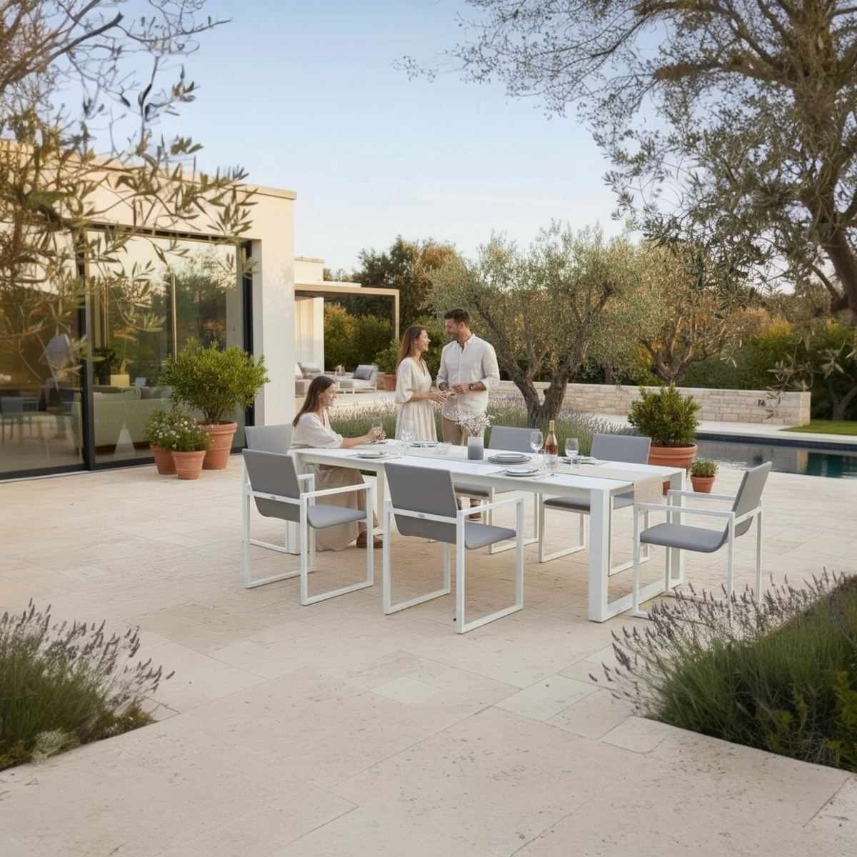 Como white aluminum ceramic-top outdoor dining table – shown outdoors