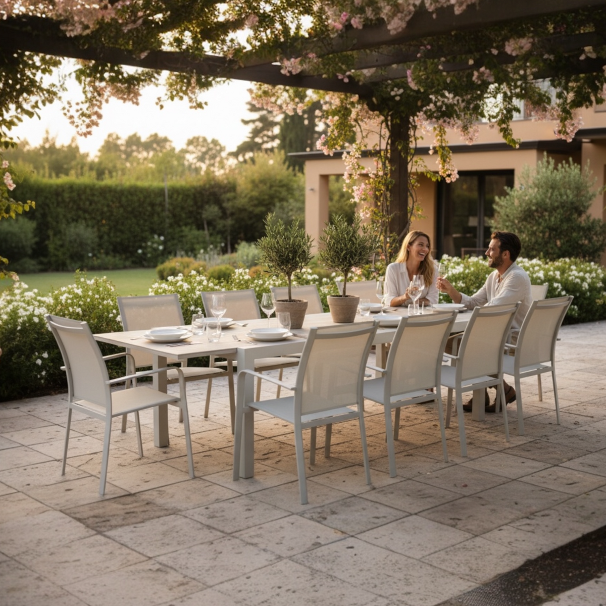 Eden extendable beige aluminum ceramic outdoor dining table – shown outdoors (3)