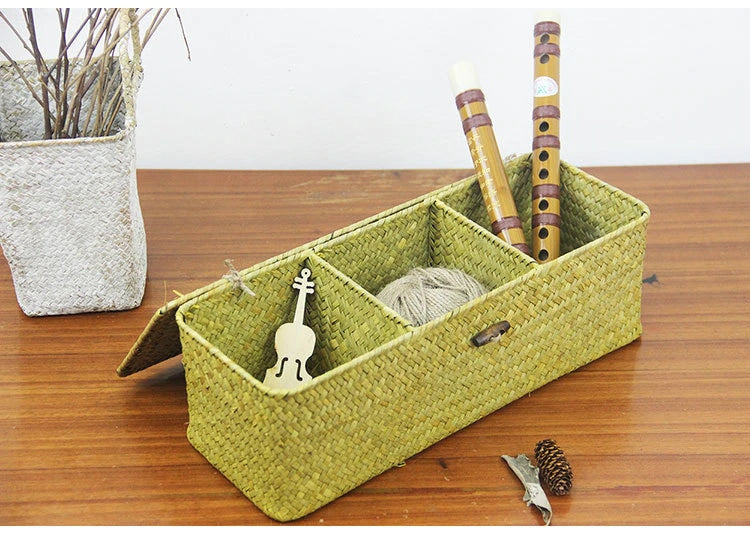 Three-compartment rattan and wicker storage box with a lid – green version, shown in a room setting (2)