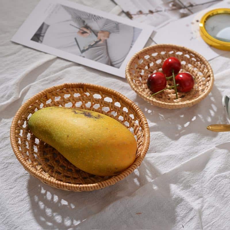 Round handwoven rattan bread and serving basket – shown in a room setting (3)