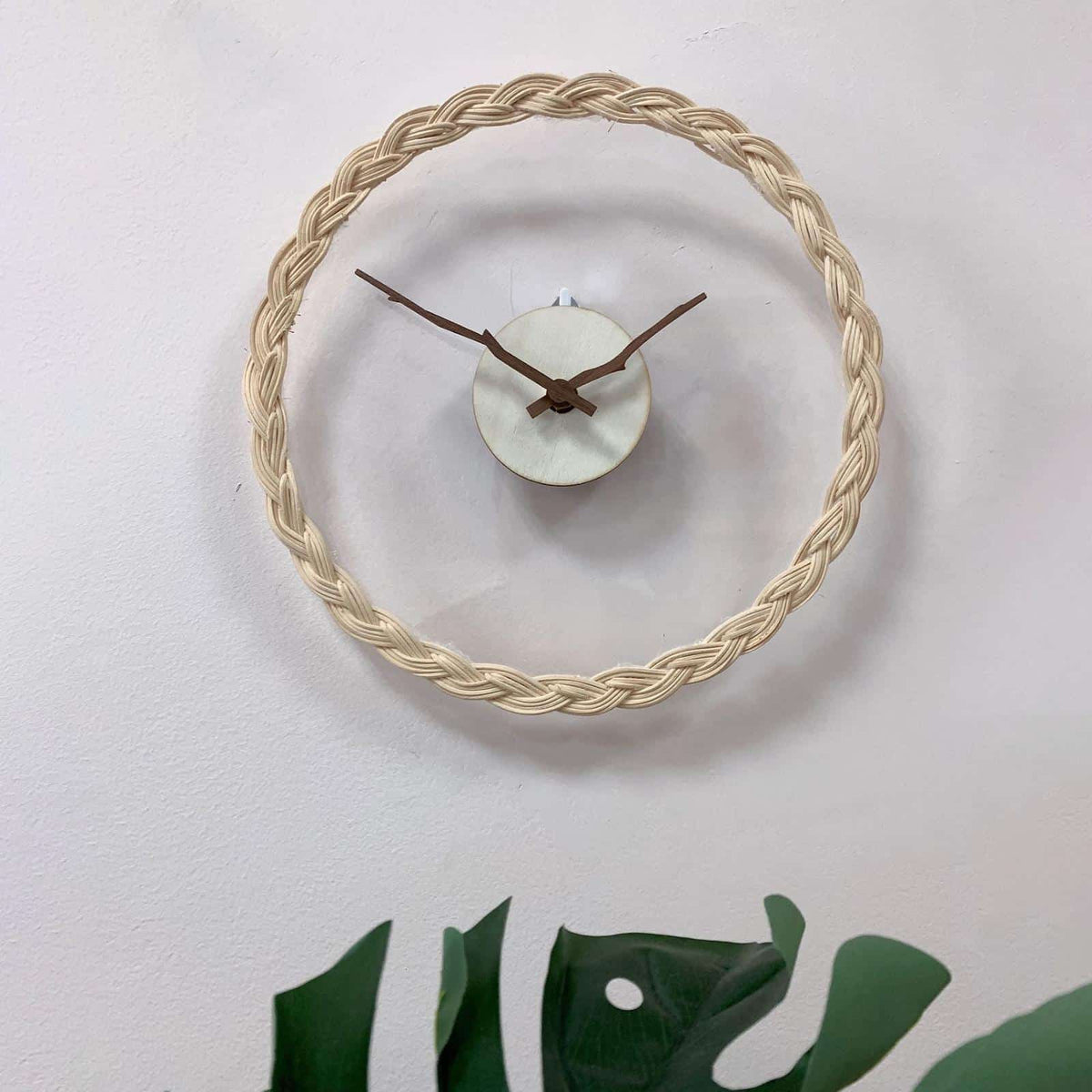 Minimal rattan wall clock with branch-like rattan hands – another view (2)