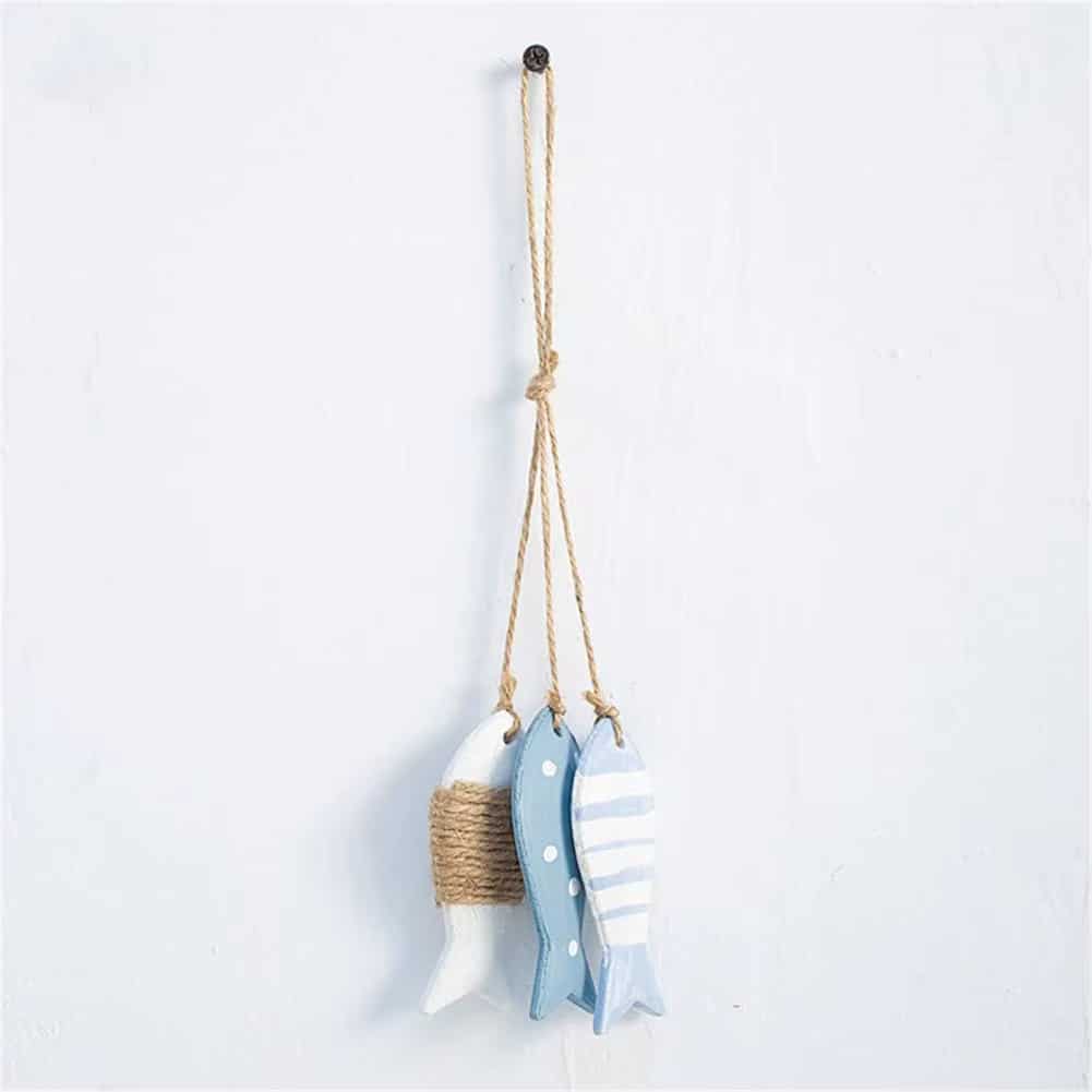 Set of three wooden fish in graduated sizes