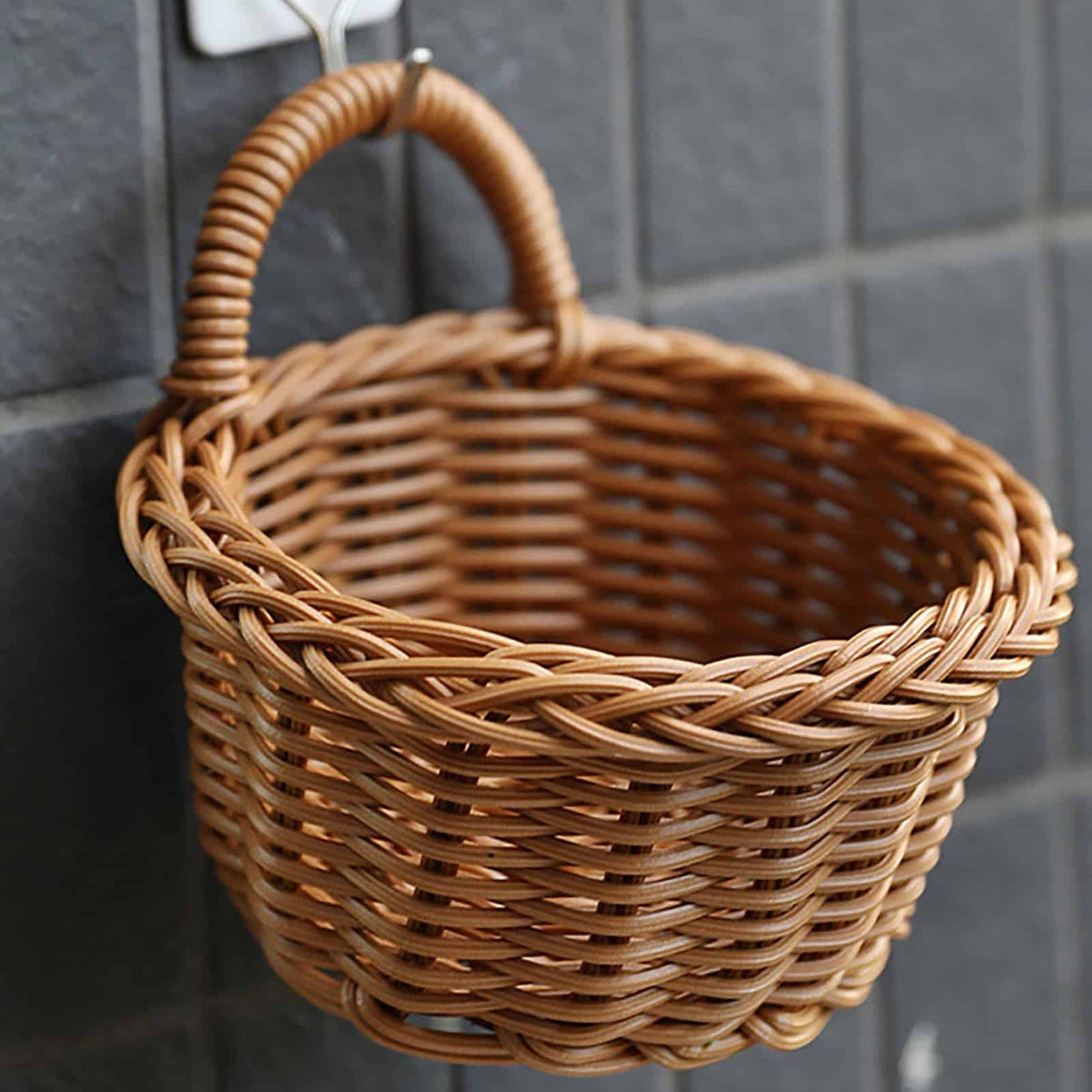 Handmade woven storage basket with a reinforced rim and handles